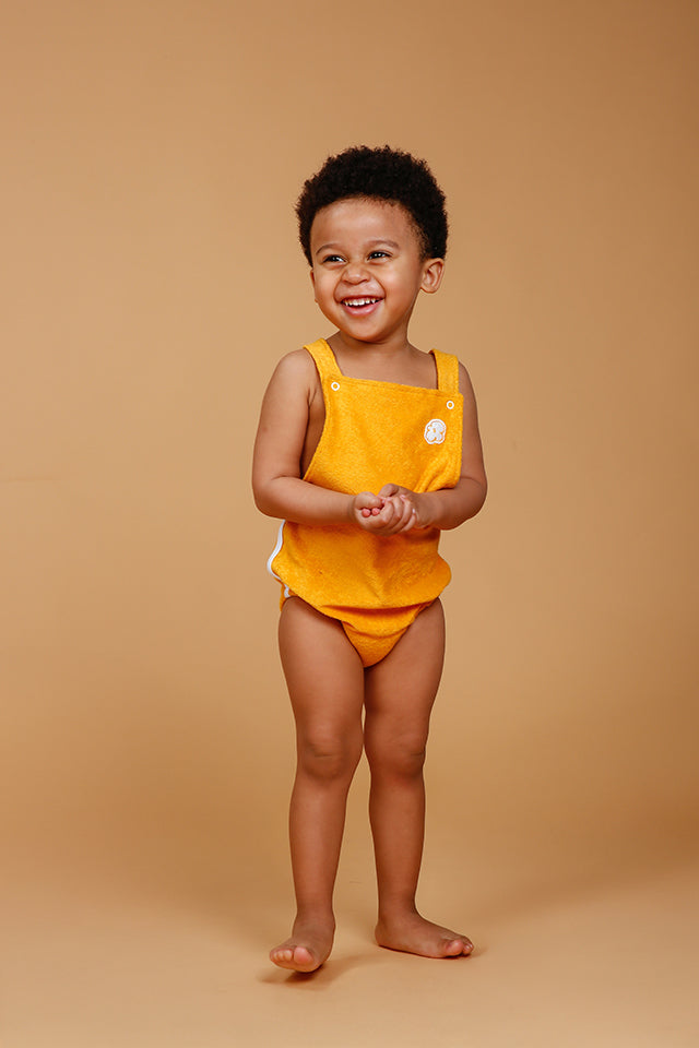 Jardineira Bebê Atoalhada Mostarda