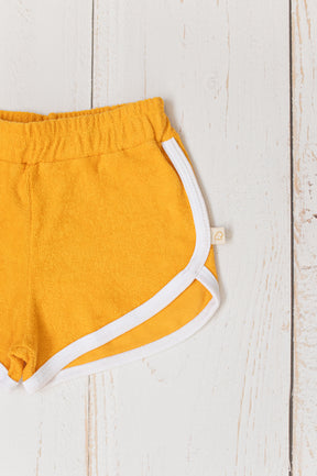 Short Bebê Atoalhado Mostarda